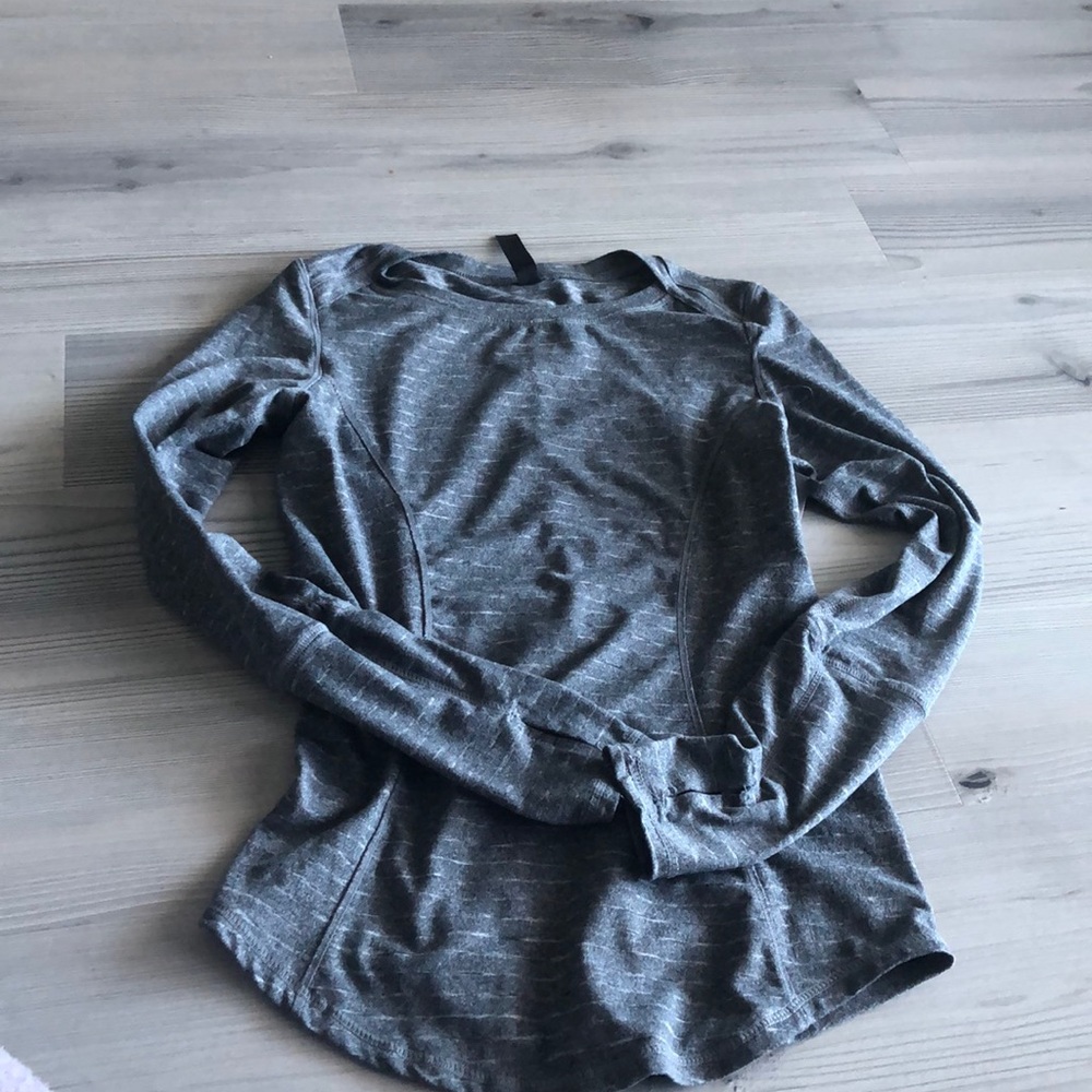 Gray striped running top.
